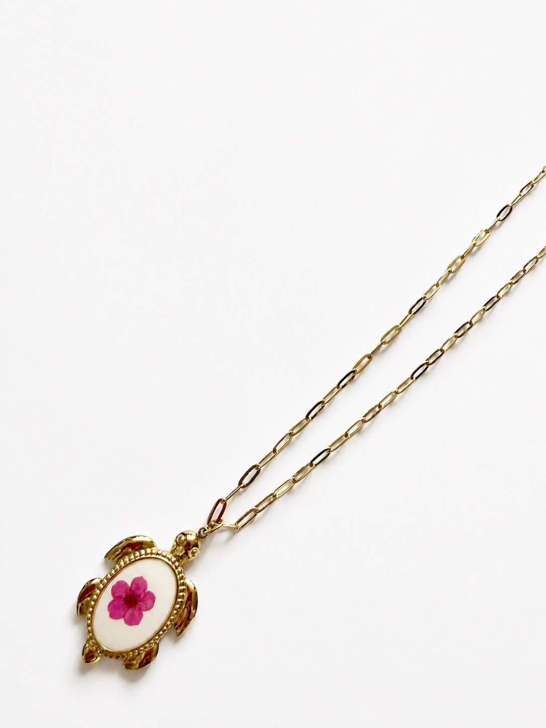Collana guscio fiorito